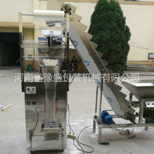 全自动袋装称重定量串珠颗粒包装机水钻颗粒包装机纽扣小五金颗粒自动包装机图1