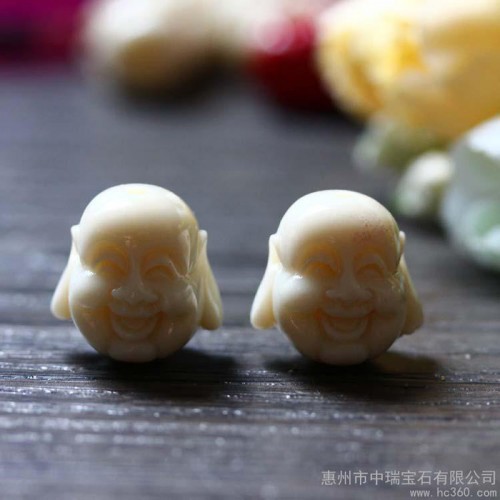 供应中瑞宝石** 米色天然珊瑚佛头饰品配件 尺寸约17X17X14MM图1