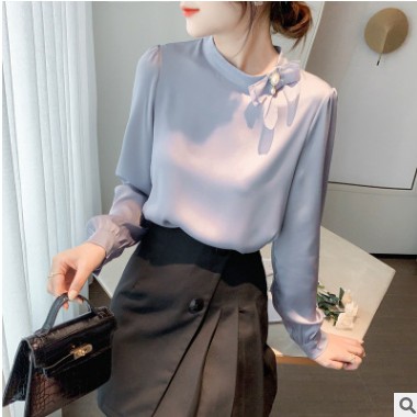 蕾丝拼接雪纺打底衫女2021春装气质荷叶边拼接立领上衣泡泡袖衬衫图3