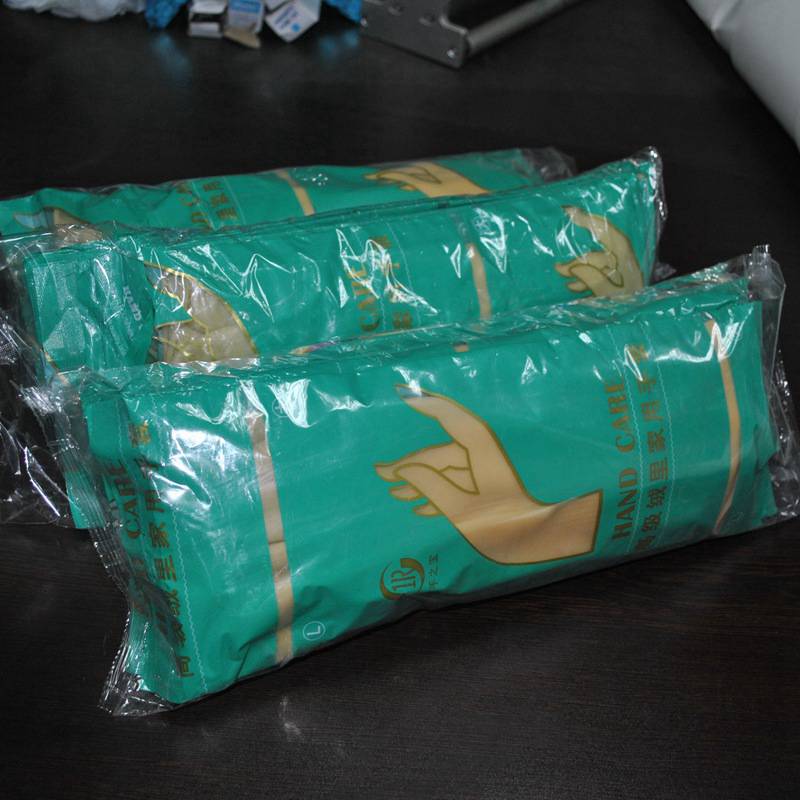 手套枕式包装机棉纱手套包装机可全自动点数下料赛诺厂家